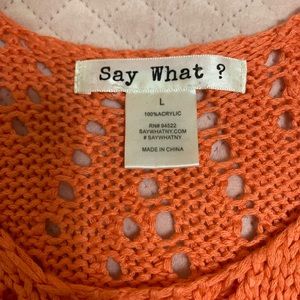Orange crocheted bathing suit cover shirt. 70s style w/ fringe